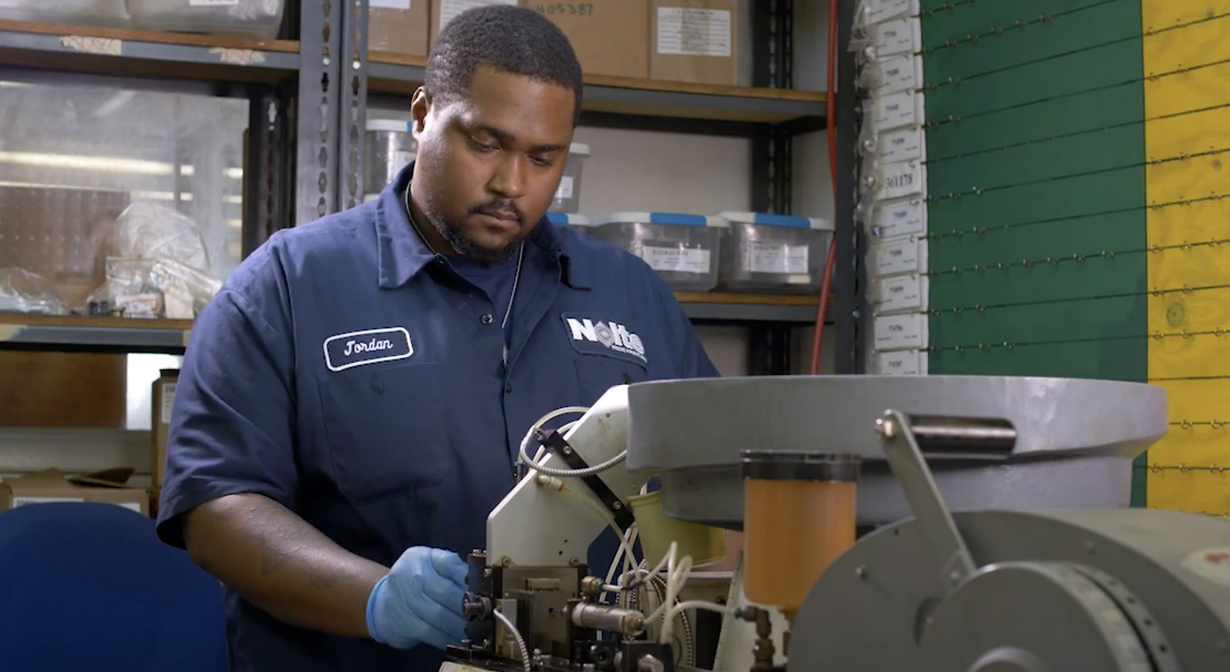 Machine shop image with man working industrial manufacturing job