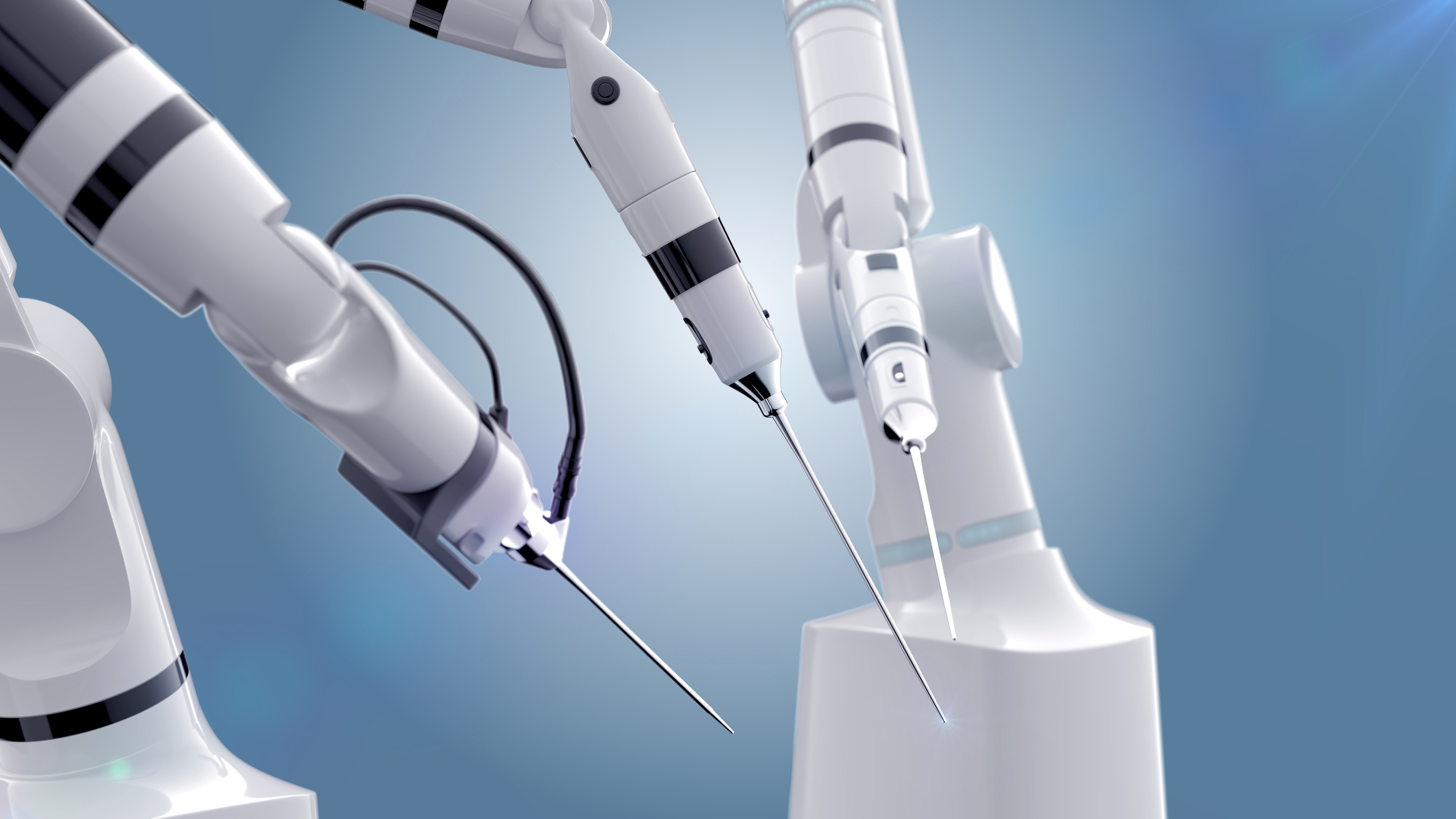 High ech Medical Devices - Three robot surgeon arms and an operating table